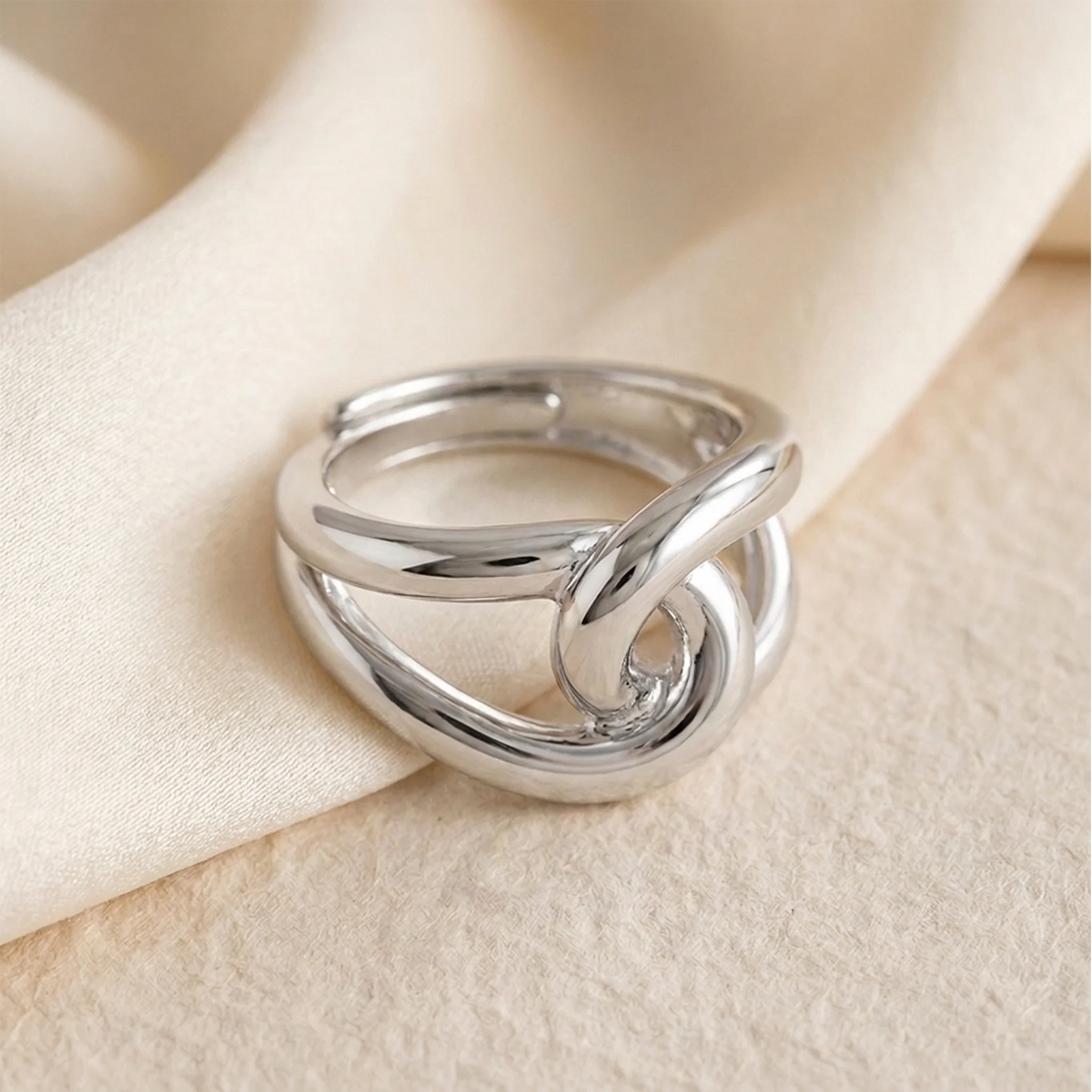 Silver Knot Statement Ring — Close-up view of a silver knot ring